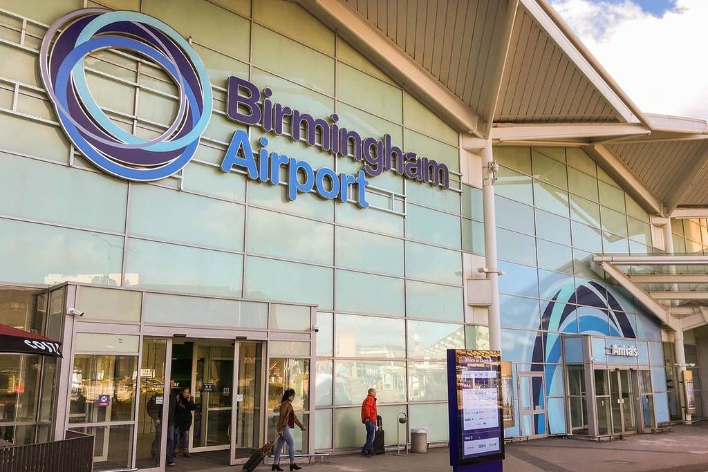 Birmingham Airport, Birmingham, England- March 2018: Wide angle exterior view of the terminal building