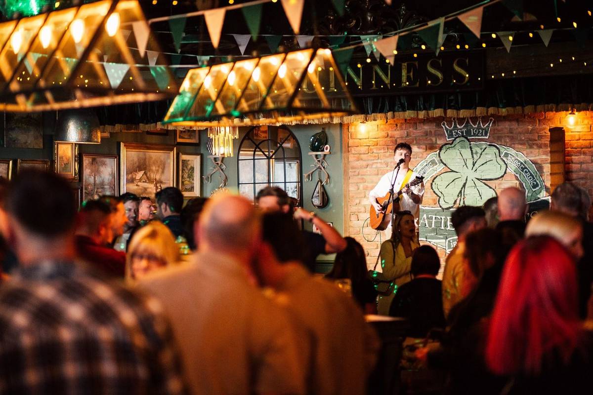 A musician performing at Katie O'Brien's