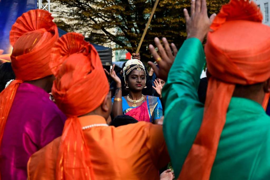A crowd of people celebrating Diwali in Birmingham