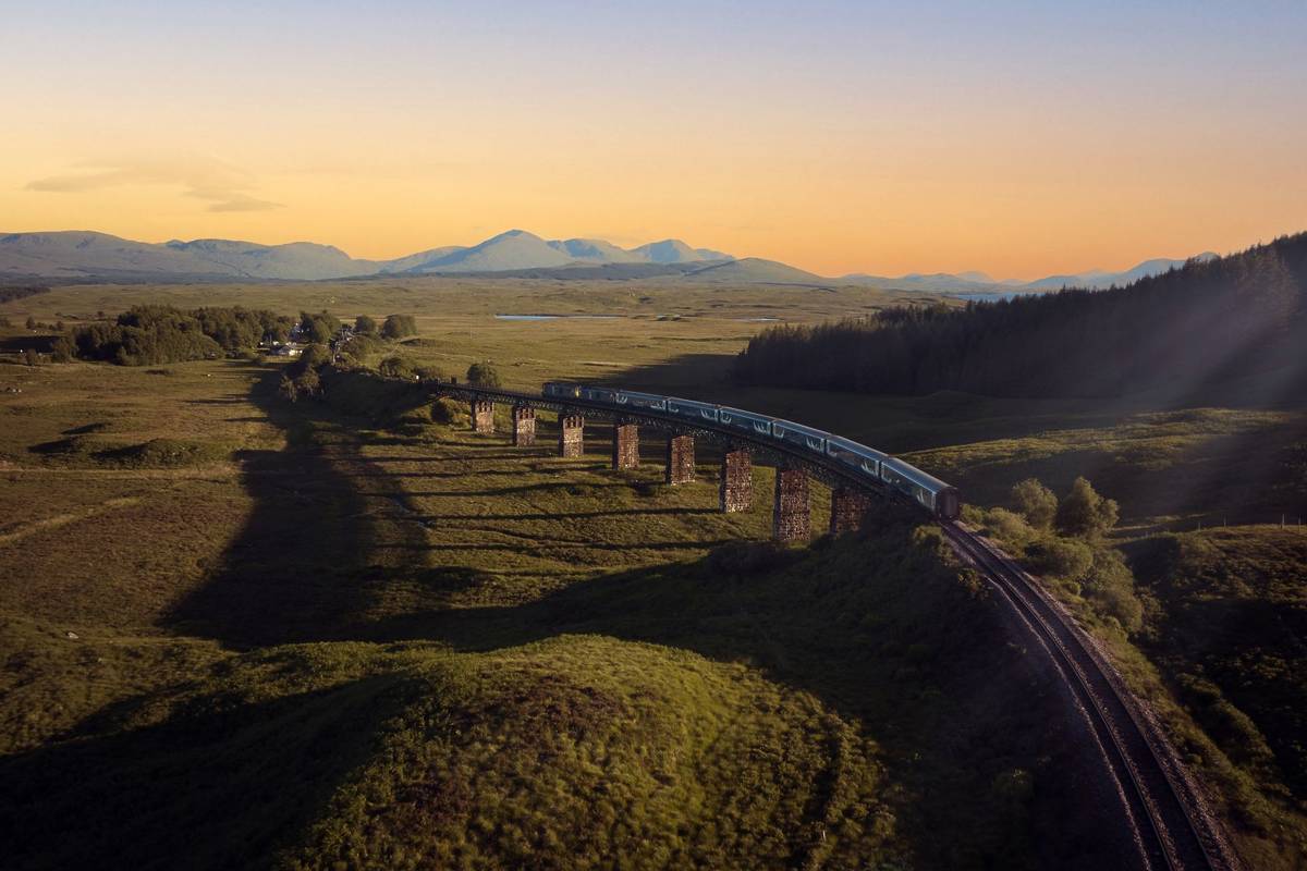 Caledonian Sleeper in the Scottish Highlands at sunset