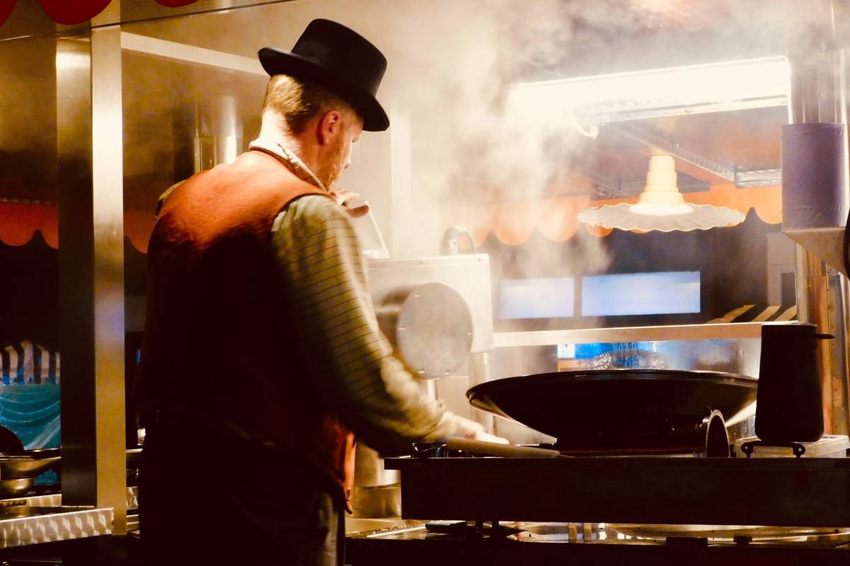 Market holder cooking, Worcester’s victorian Christmas fair.