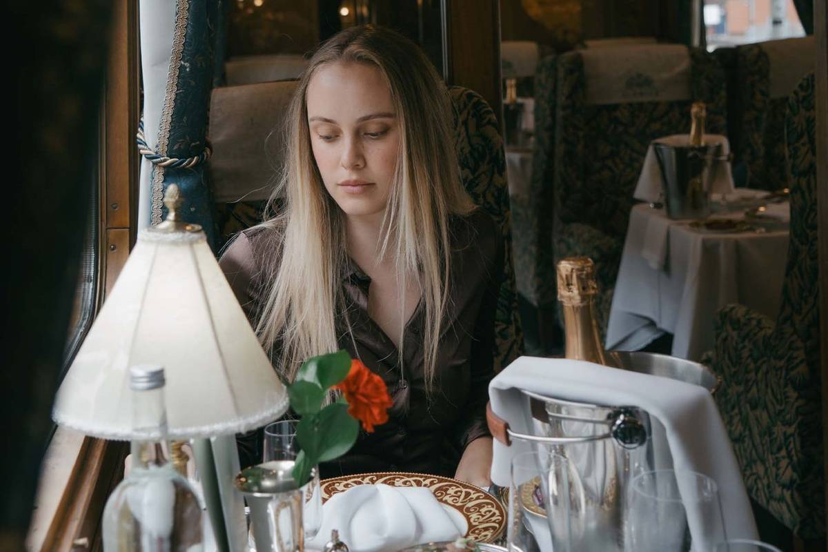A diner tucking into Christmas lunch on the Northern Belle