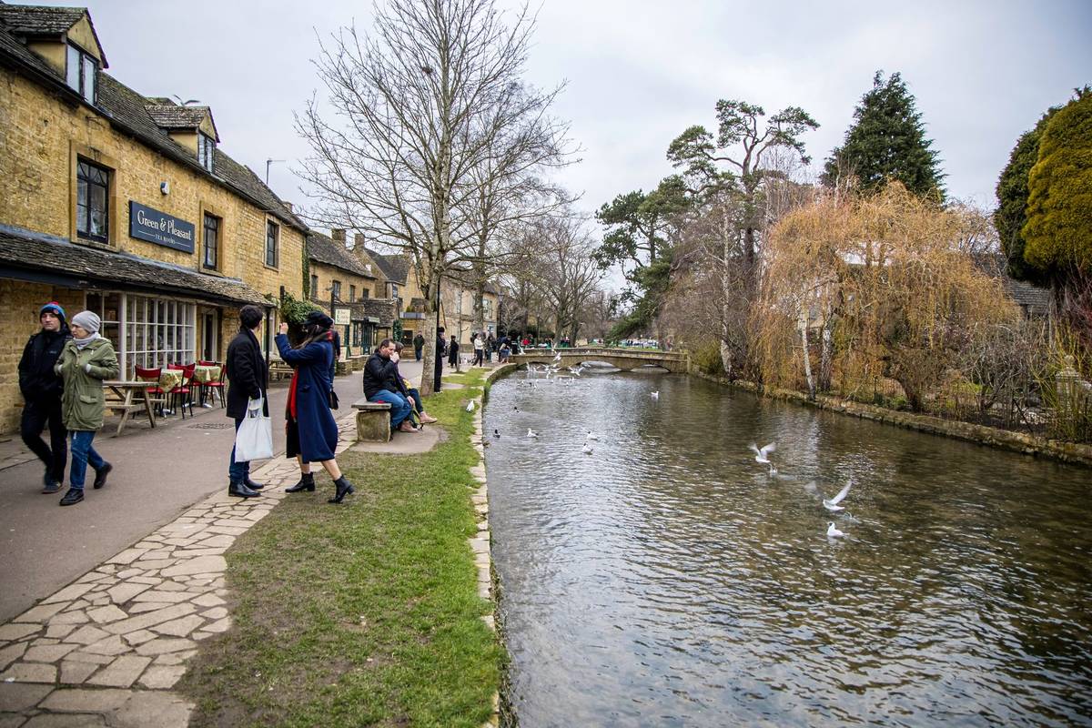 Bourton On Water, UK - May 10, 2023: Town center and river Windrush, Cotswold's