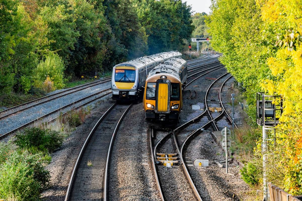 Dorridge Station Solihull West Midlands England UK. Dec.3rd. 2023. A diesel passenger commuter train is leaving the station. Passengers on the platform.
