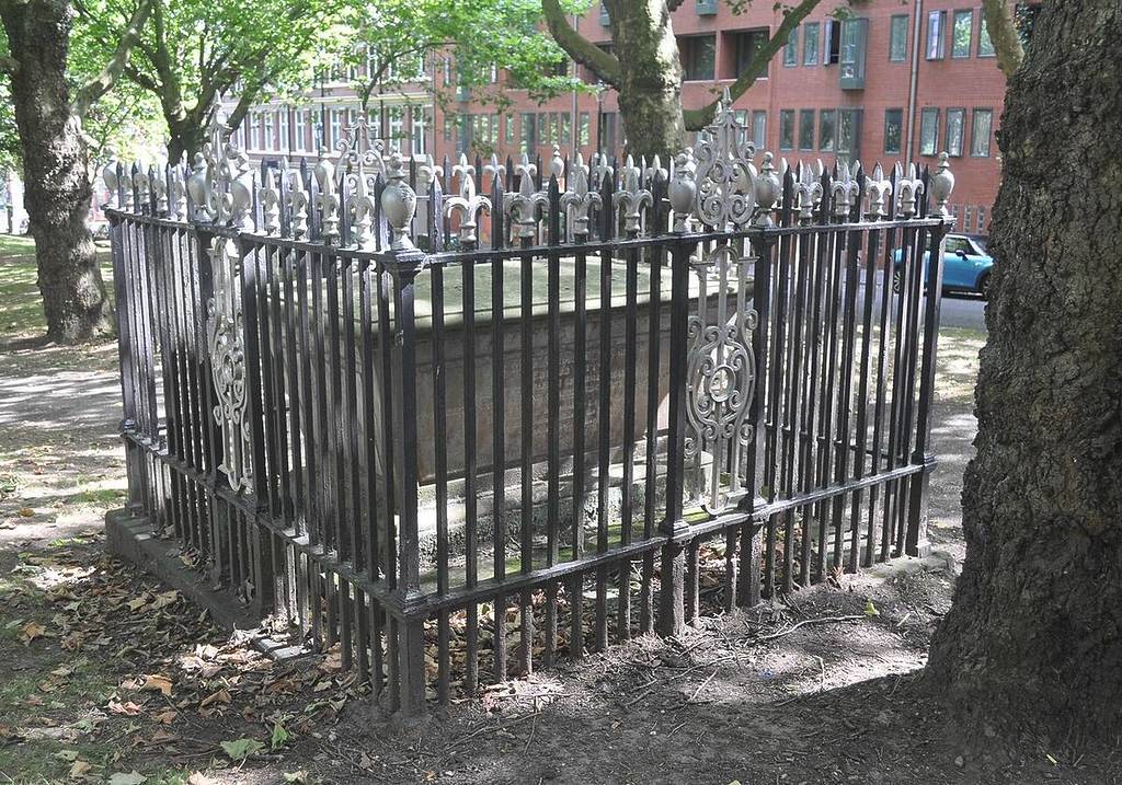 The table tomb, surrounded by a fence at St. Paul's Church in Birmingham.