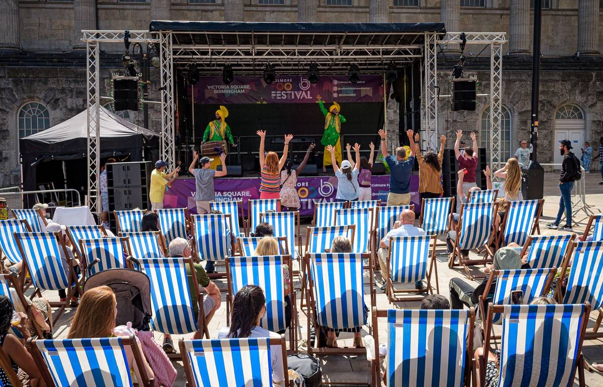 The crowd watching a stage in Victoria Square