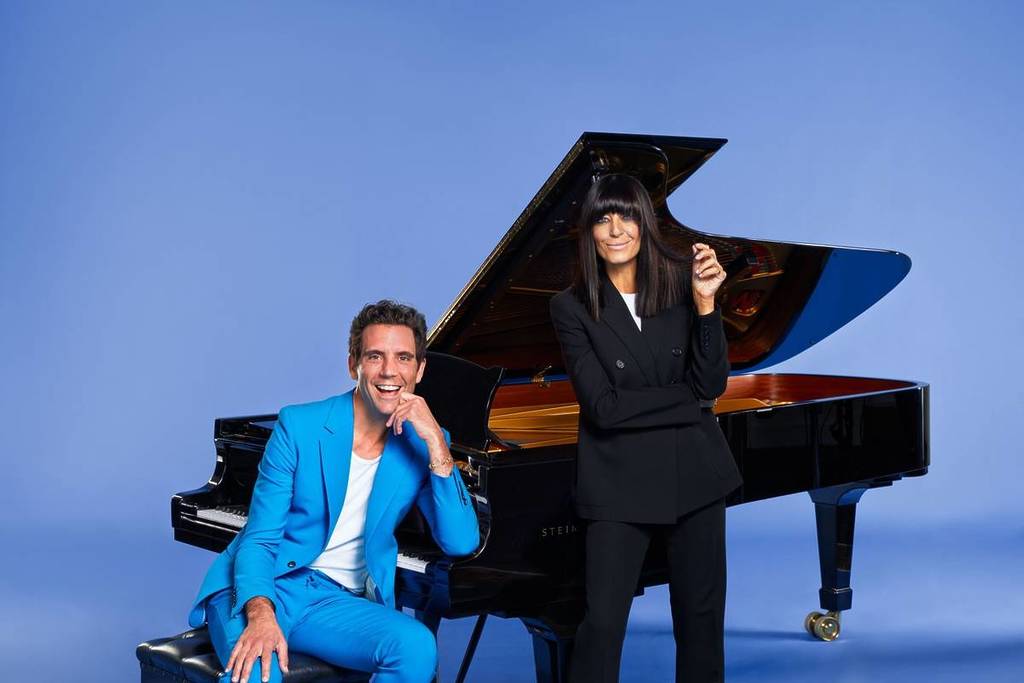 A grand piano, with Mika and Claudia Winkleman