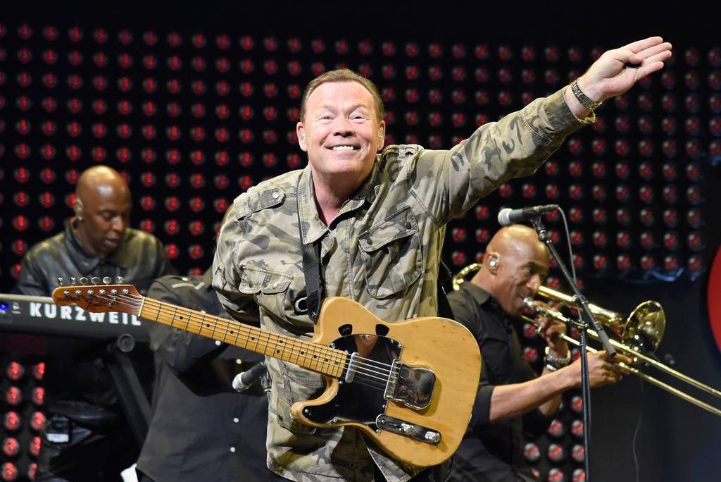 SAN JOSE, CA - JANUARY 28: Musician Ali Campbell of UB40 performs on stage during the iHeart80s Party 2017 at SAP Center on January 28, 2017 in San Jose, California. (Photo by Tim Mosenfelder/Getty Images for iHeartMedia)