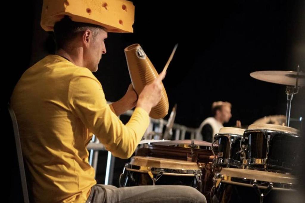 A drummer dressed as Wensleydale Cheese