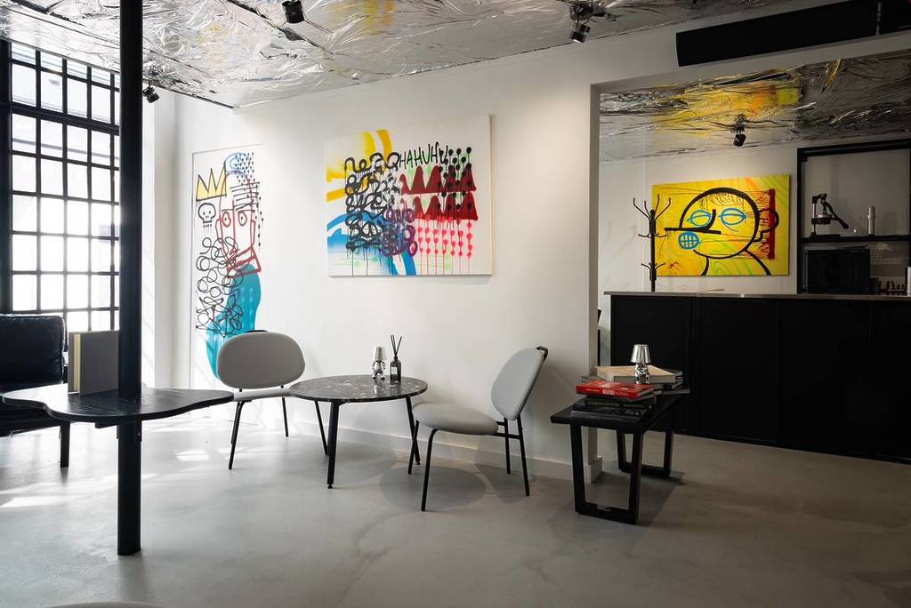 670 Grams with colourful artwork on the wall