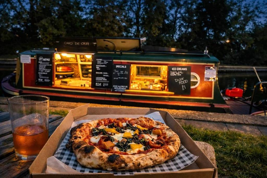 Lola The Cafe Boat at night