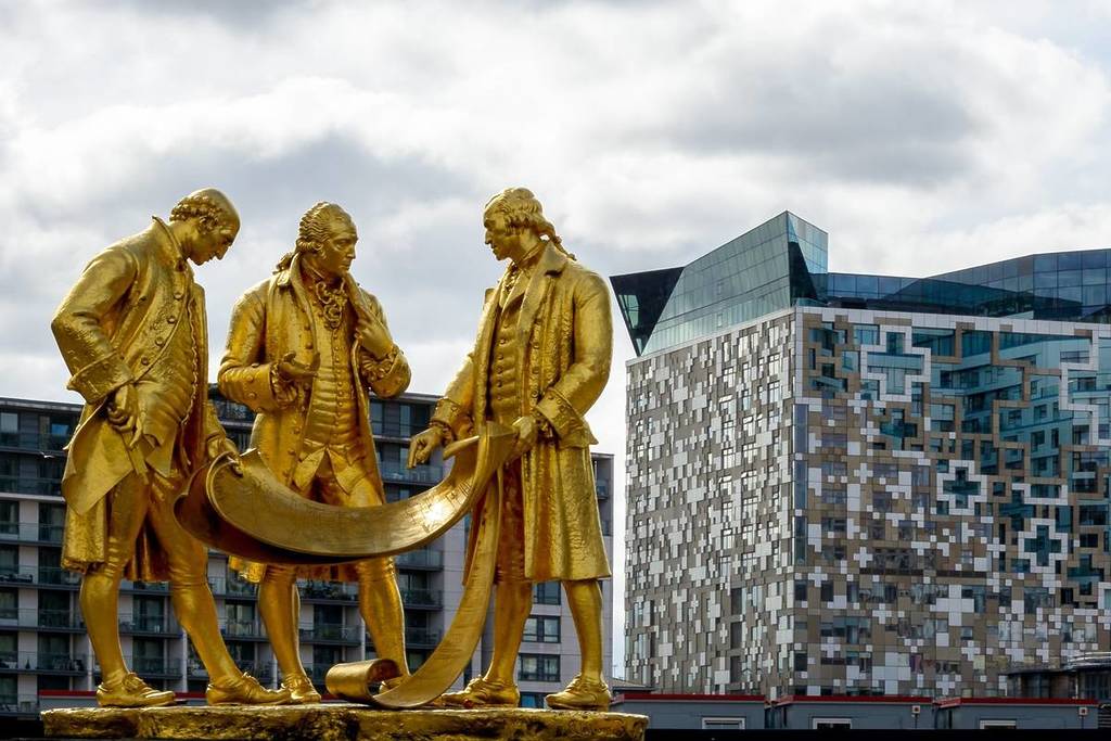 Boulton, Watt and Murdoch Statue in Birmingham against Modern Architecture Shallow Depth of Field