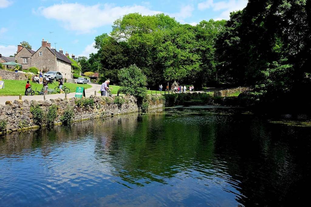 Tissington, Derbyshire, UK. May 31, 2017. The village pond and green in the centre of the village at Tissington in the Derbyshire countryside.