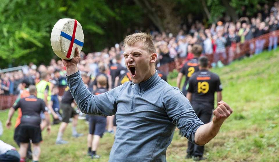 Just an hour from Birmingham, one of England’s most eccentric traditions is back this Spring Bank Holiday — with competitors tumbling down a steep hill after a wheel of Double Gloucester cheese