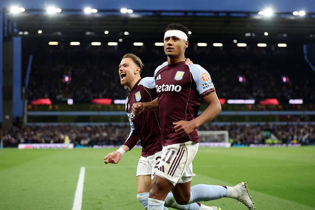 BIRMINGHAM, ENGLAND - MAY 07: Ollie Watkins of Aston Villa celebrates scoring his team's first goal with Matty Cash of Aston Villa during the UEFA Europa League 2025/26 Semi-Final Second Leg match between Aston Villa FC and Nottingham Forest FC at Villa Park on May 07, 2026 in Birmingham, England. (Photo by Michael Steele/Getty Images)