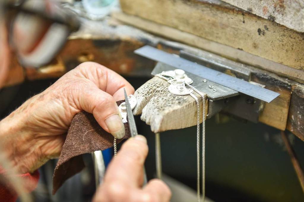 A hand filing jewellery