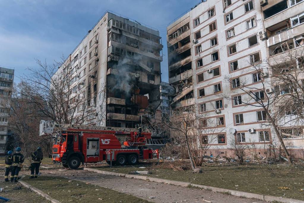 Shelled the city of Zaporozhye, Ukraine. The rocket flew into a residential building. Destroyed and burned houses in the city during the war. Zaporozhye, Ukraine - March 22, 2023
