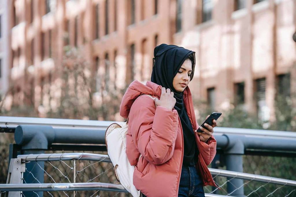A woman texting Shout