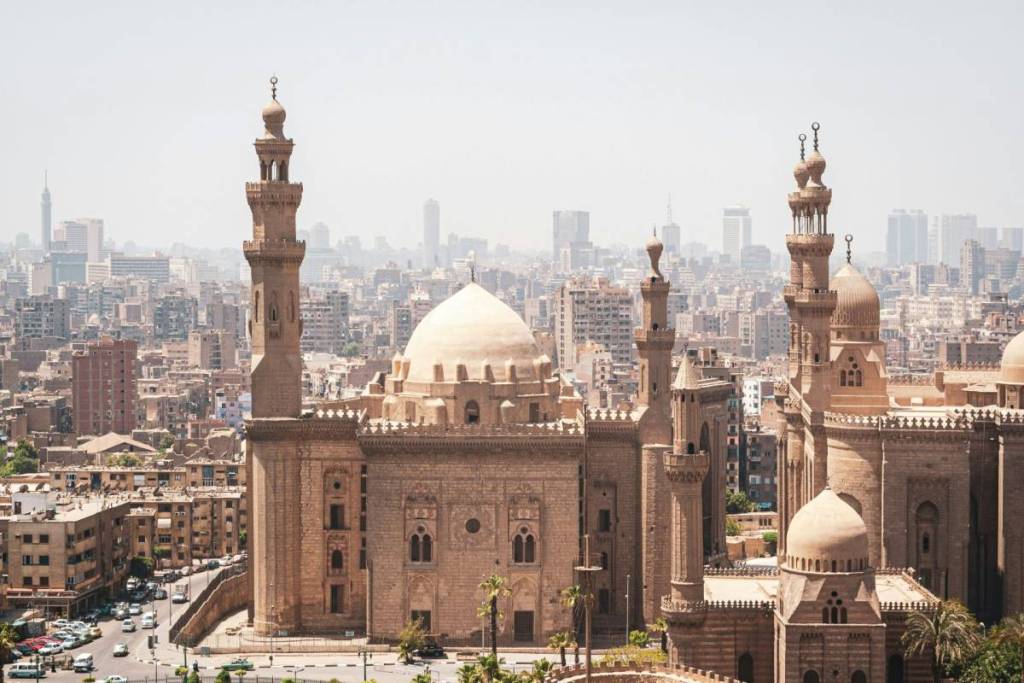 a view of a city with a lot of tall buildings
Mosque-Madrasa of Sultan Hassan