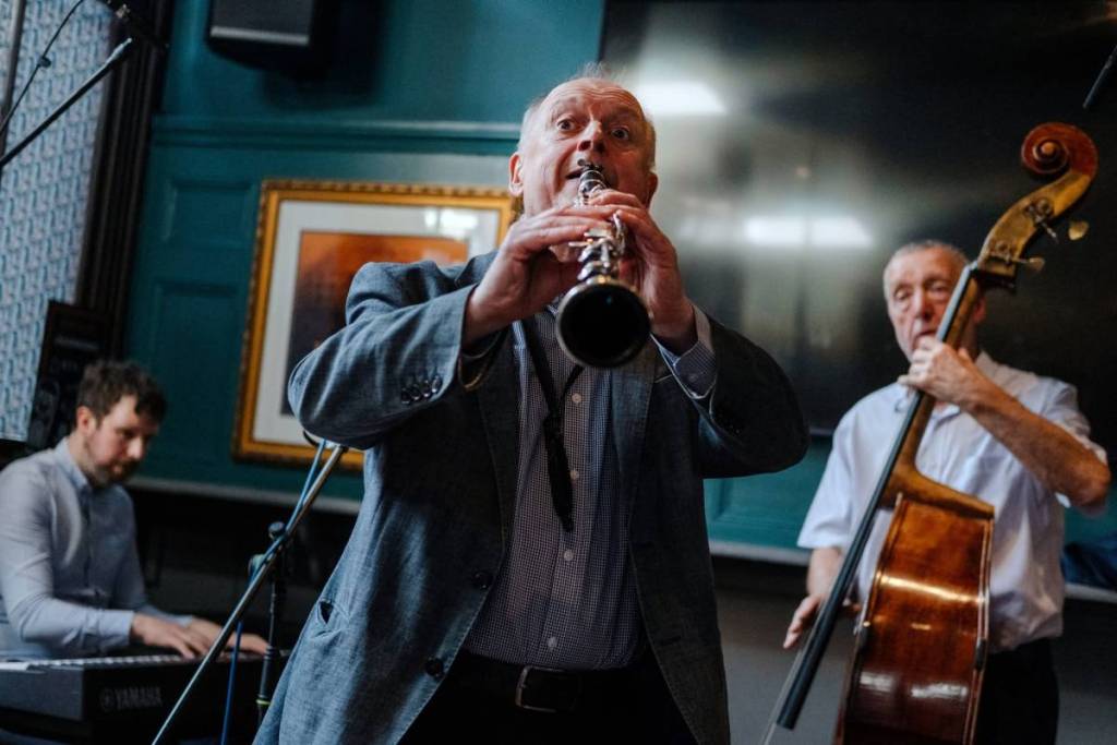 A man playing an oboe