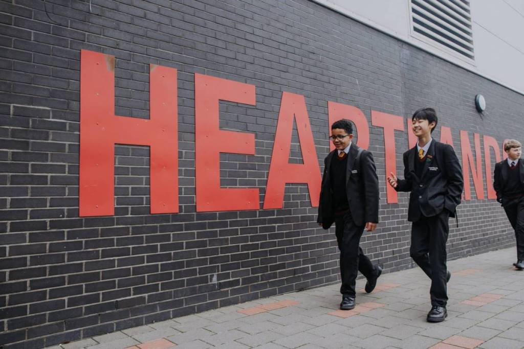 Children in front of Heartlands Academy