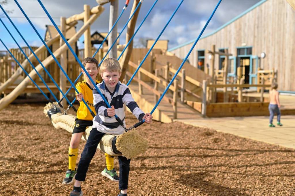 Two boys playing at Hockerhill Adventure Playbarn