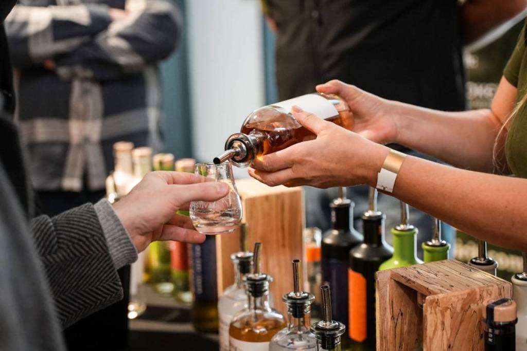 Pouring whisky at the English Whisky Festival