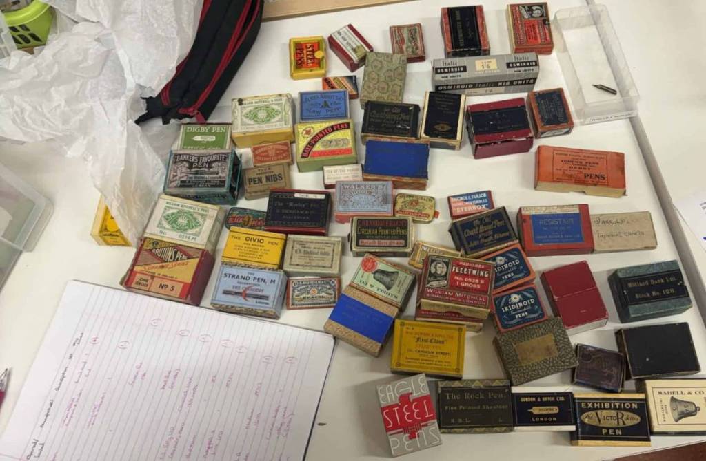An assortment of pen nib boxes