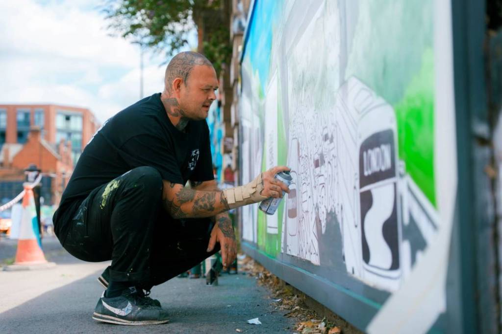 Gent 48 creating the mural in Digbeth