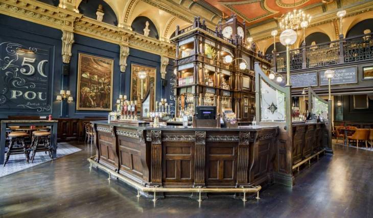 Birmingham’s “unbeatably beautiful” golden pub was originally built as a cathedral library – but it now houses a secret, 100-seat fringe theatre