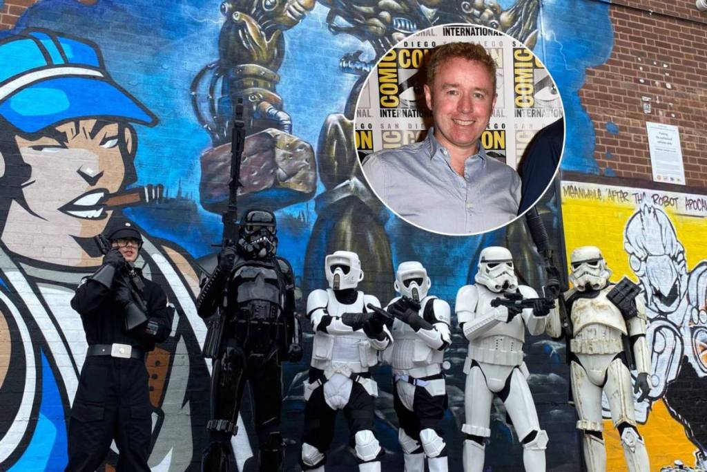Star Wars cosplayers, the 501st Legion UK Garrison infront of a 2000 AD mural / Screenwriter Mark Millar, comic book artist Dave Gibbons and screenwriter Jane Goldman attend 20th Century Fox Press Line during Comic-Con International 2014 at Hilton Bayfront on July 25, 2014 in San Diego, California. (Photo by Frazer Harrison/Getty Images)