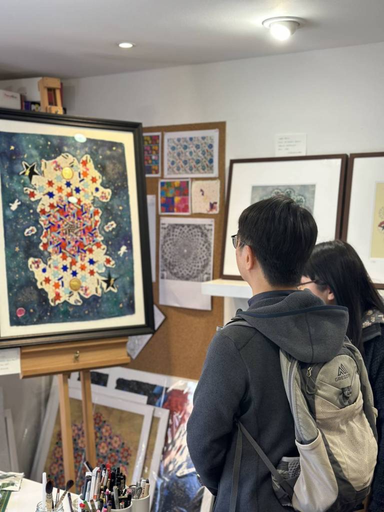 Two members of public in an art studio for Birmingham Open Studios