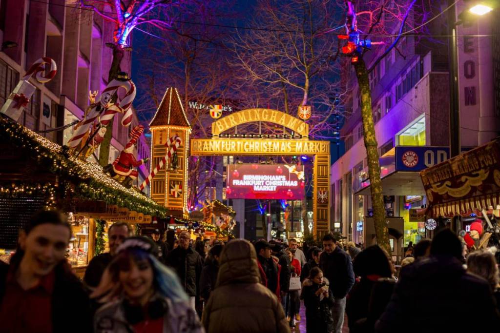 BIRMINGHAM, UNITED KINGDOM - DECEMBER 15, 2019: View over New Street at night during annual Frankfurt Christmas Market