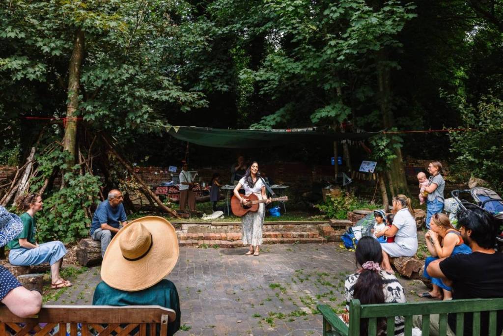 A performance in the gardens of Highbury Hall