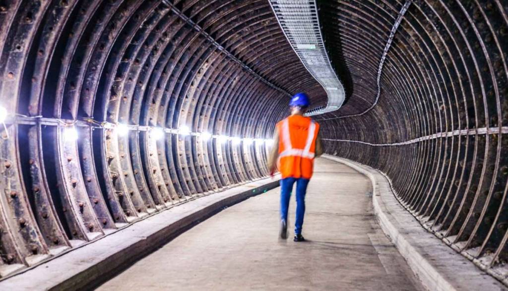 man walking with high vis on for mail tunnel tour for birmingham heritage week
