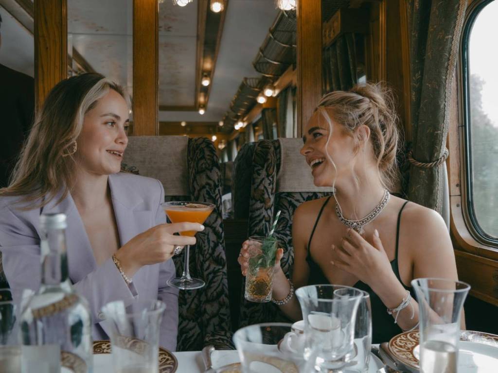 Two women eating Christmas lunch aboard the Northern Belle