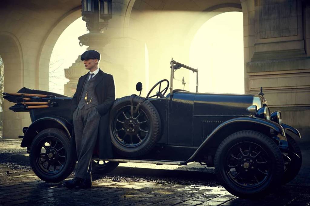 Tommy Shelby led against a car in Peaky Blinders
