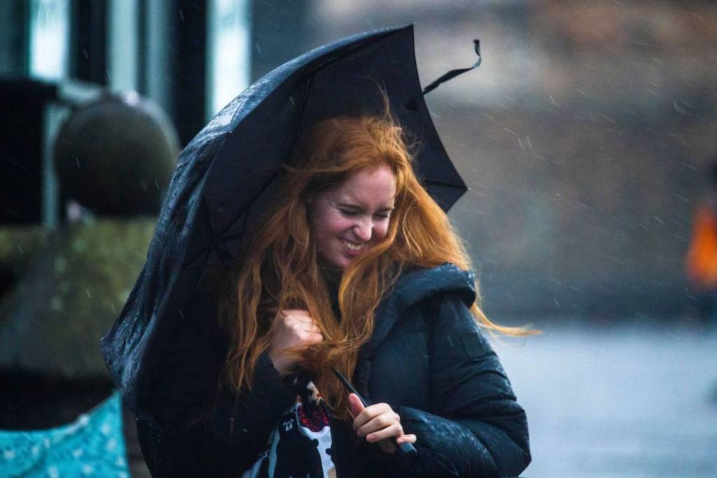 Edinburgh, Scotland, 02.16.2022 Public scenes on the Royal Mile as Edinburgh is under a Met weather Amber warning for high winds starting at 2pm through till Thursday morning.