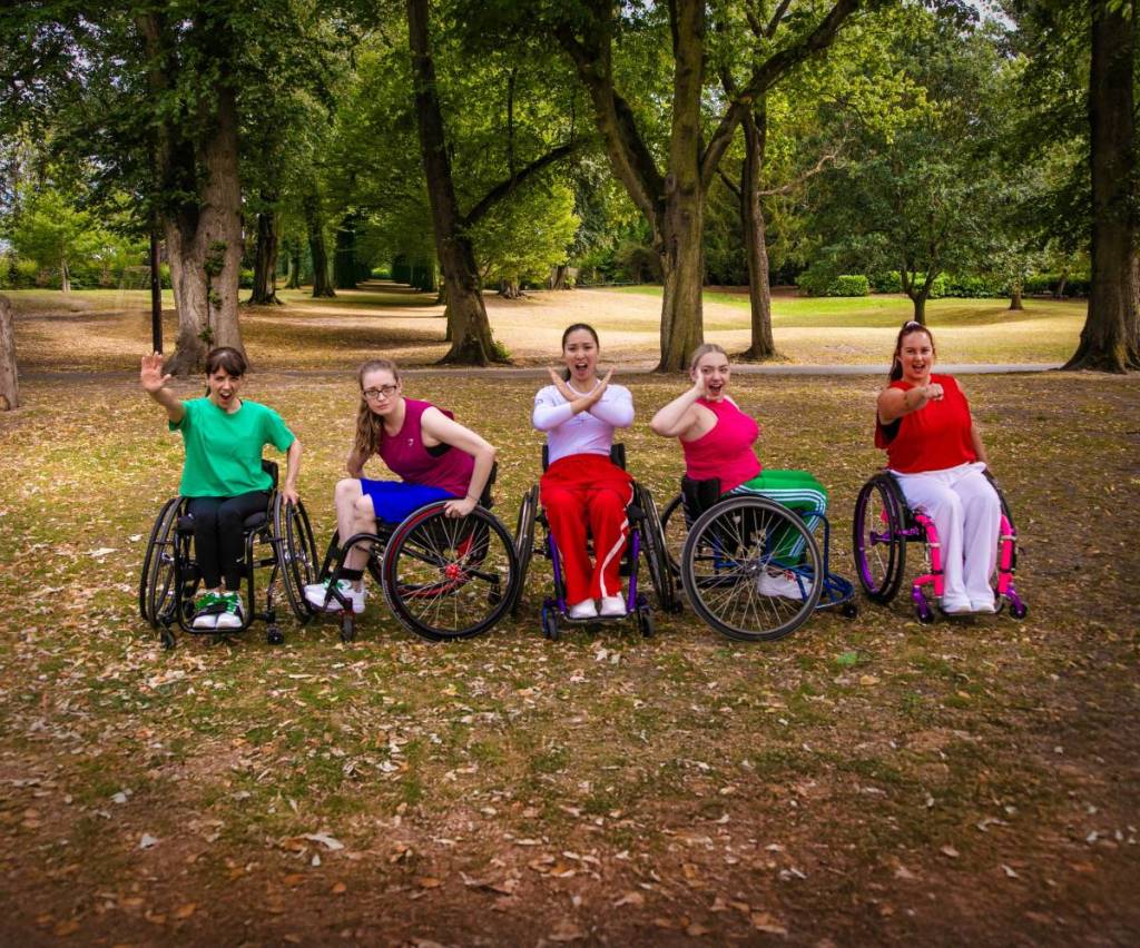 5 Propel Dance wheelchair performers in a park