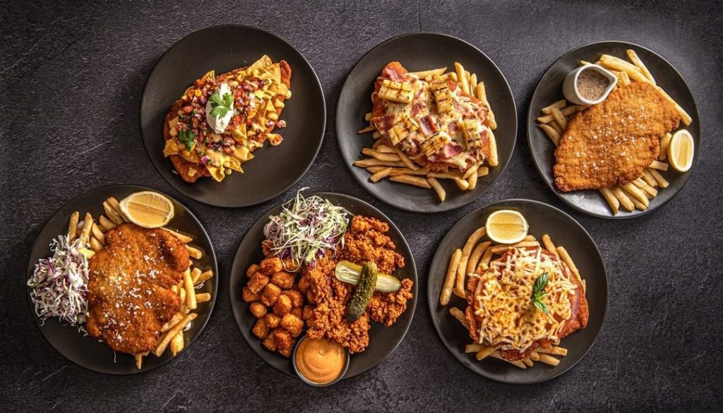 This German Eatery Is Serving Up 10 Schnitzels Every Wednesday For Just $10 Each · The Bavarian