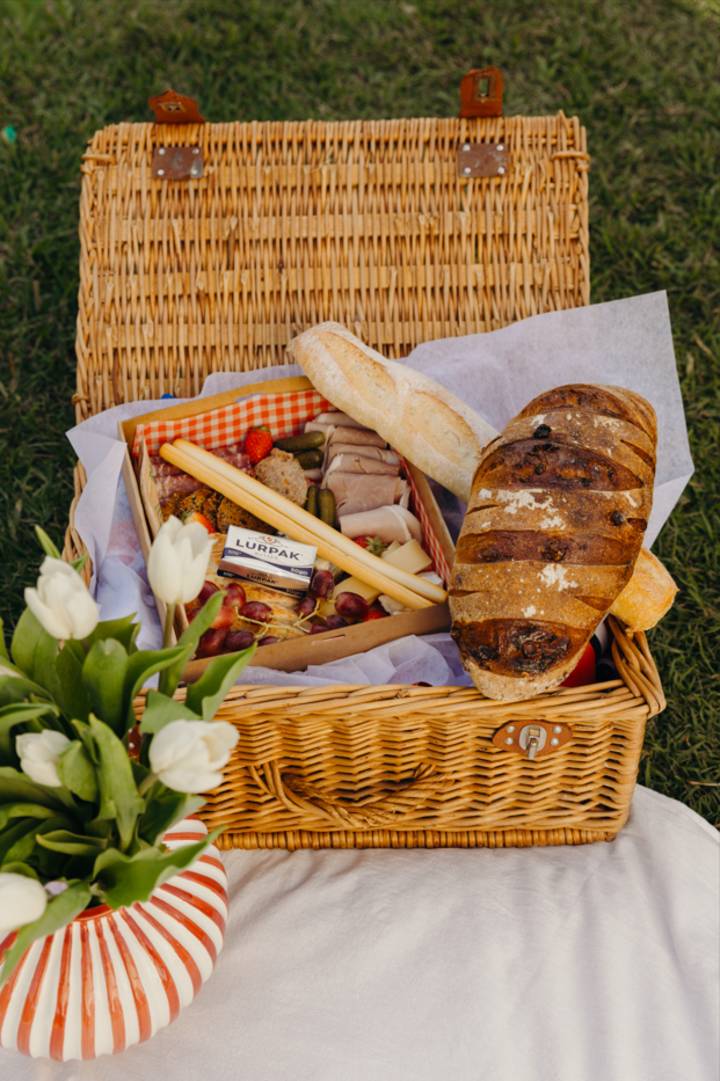 le festival picnic basket baguette butter flowers