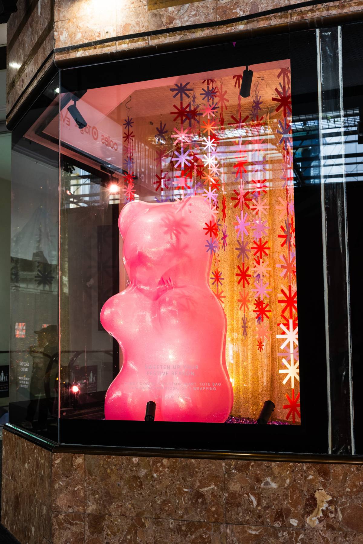 uptown candy coated christmas windows giant bear