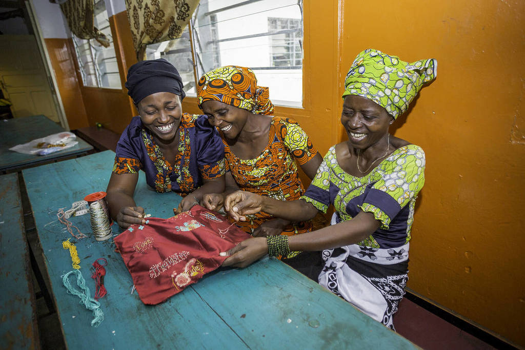 the red dress making of embroiderers