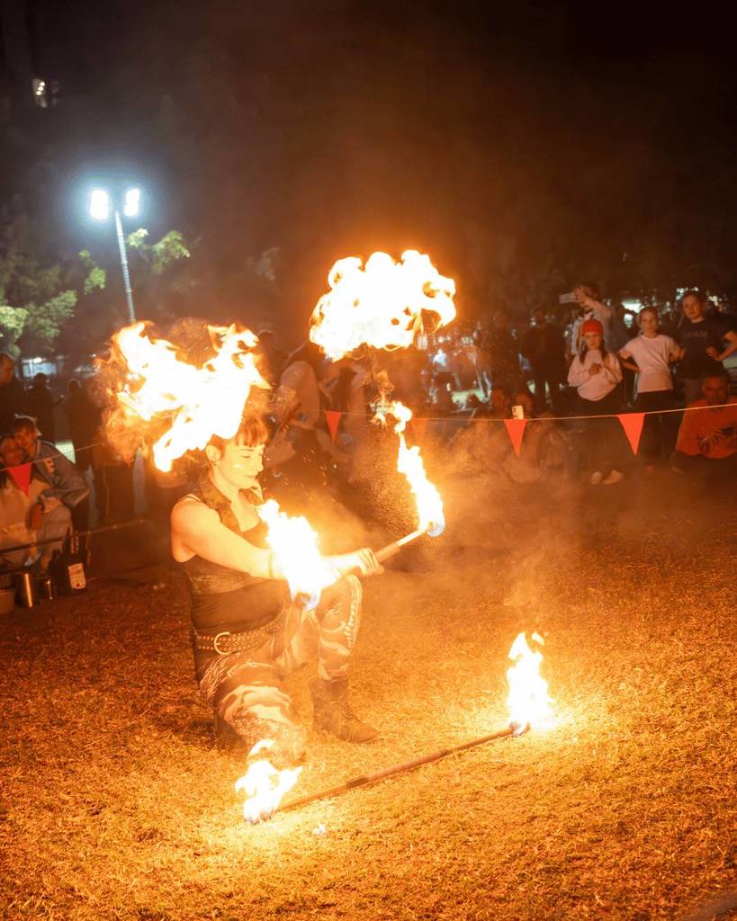 west end winter solstice market roving performer fire