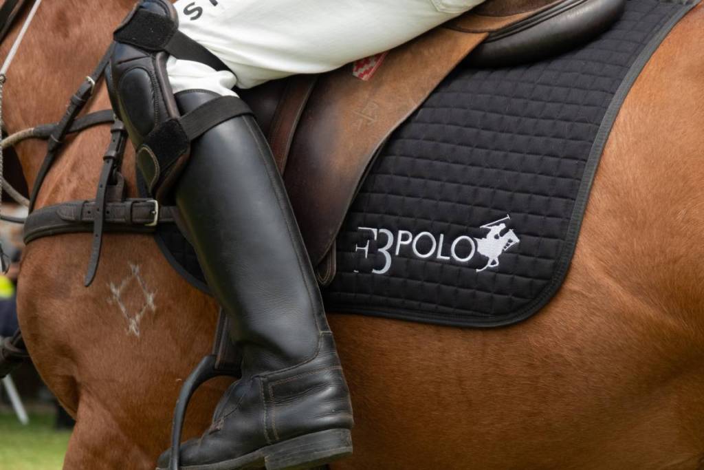 A close-up shot of a rider's foot in the stirrups at F3 Polo Brisbane.