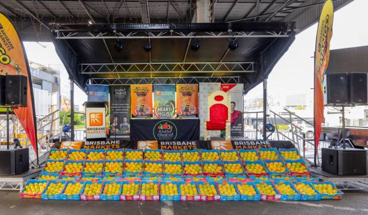 A 20-year Brisbane spring tradition returns to Rocklea with $5 raffle tickets, sausage sizzles, and the iconic bidding war for the season’s first tray of mangoes