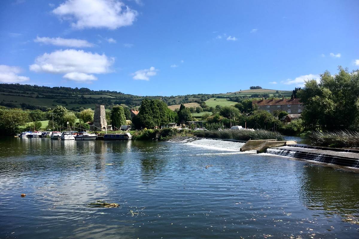 Weir on the River Avon near Saltford between Bath and Bristol in the UK on a summers day