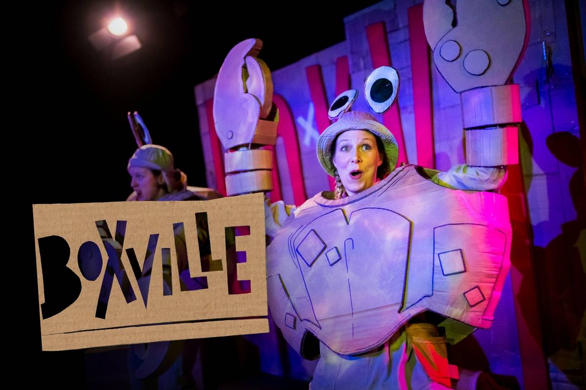 A cardboard lobster costume