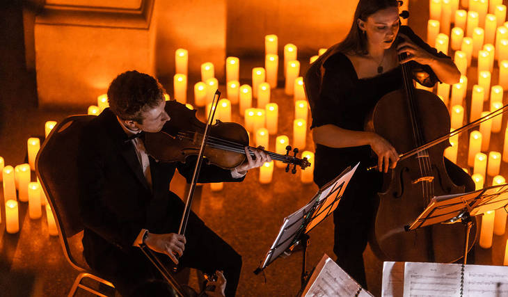 Thousands of flickering candles are illuminating St Mary Redcliffe Church this summer — with live string quartets and pianists