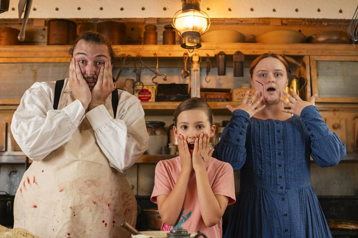 Showing off make-up wounds on the SS Great Britain